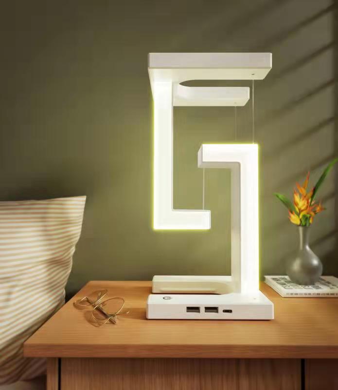 Kreatywna bezprzewodowa magnetyczna lampa wisząca z możliwością ładowania smartfonów. Nadaje świetnego, eleganckiego wyglądu do domu