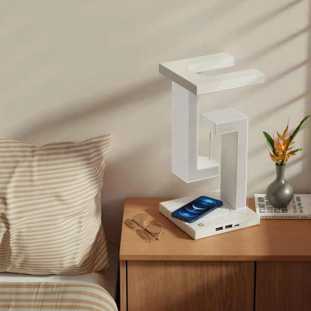 Kreatywna bezprzewodowa magnetyczna lampa wisząca z możliwością ładowania smartfonów. Nadaje świetnego, eleganckiego wyglądu do domu