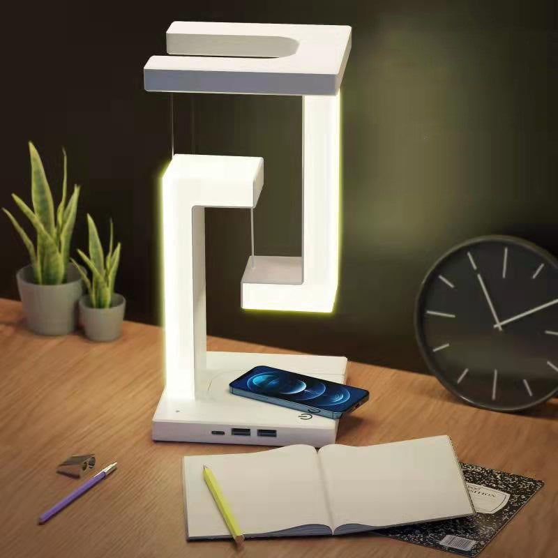 Kreatywna bezprzewodowa magnetyczna lampa wisząca z możliwością ładowania smartfonów. Nadaje świetnego, eleganckiego wyglądu do domu